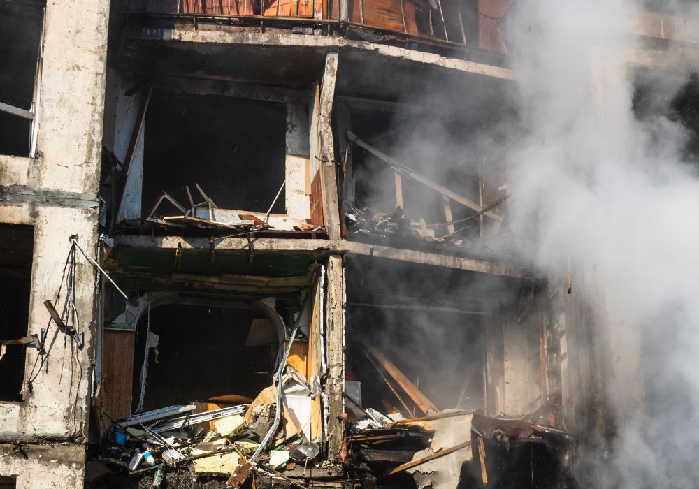 Burned building exterior after fire damage